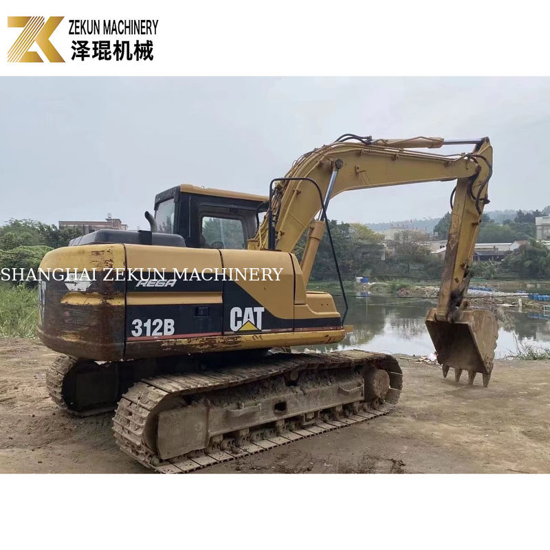 2000 Yılı Cat 312B Kullanılmış sürünen kazıcı 12 ton 63KW ikinci el kazıcı